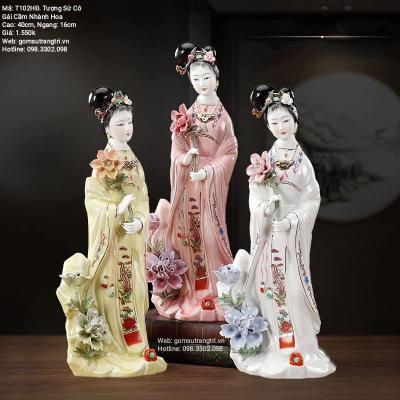 TƯỢNG SỨ CÔ GÁI CẦM NHÁNH HOA
